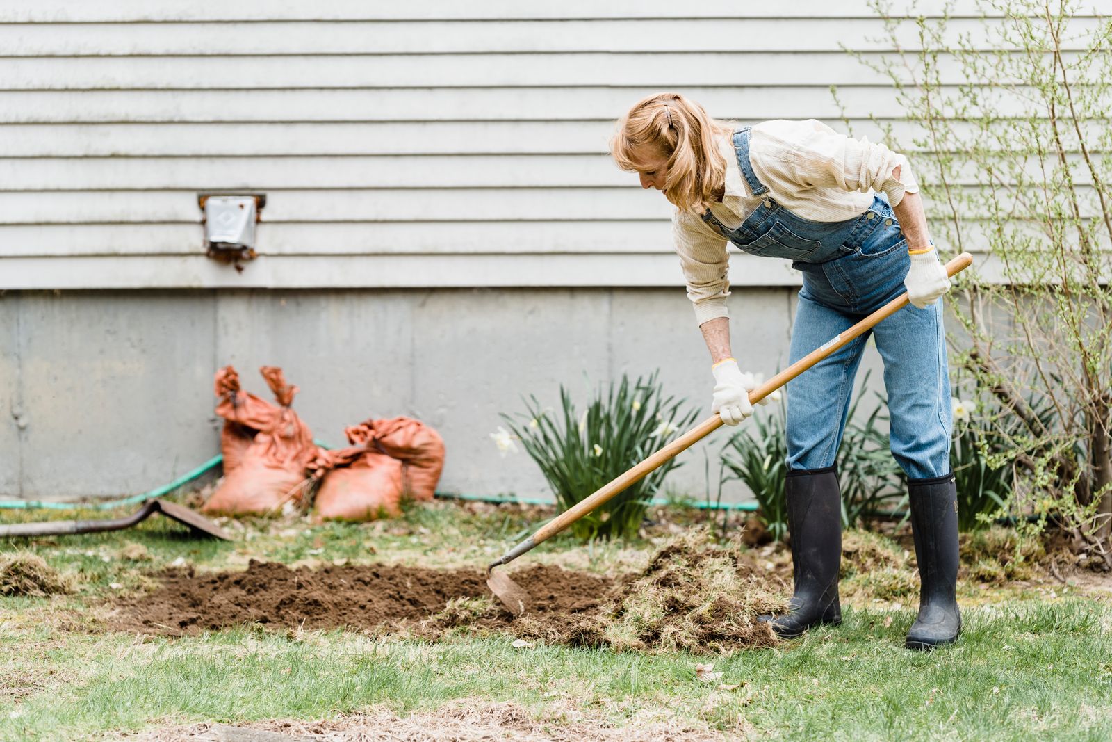 Landscaper preparing a garden bed